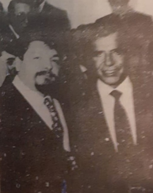 Junto a Carlos Menem